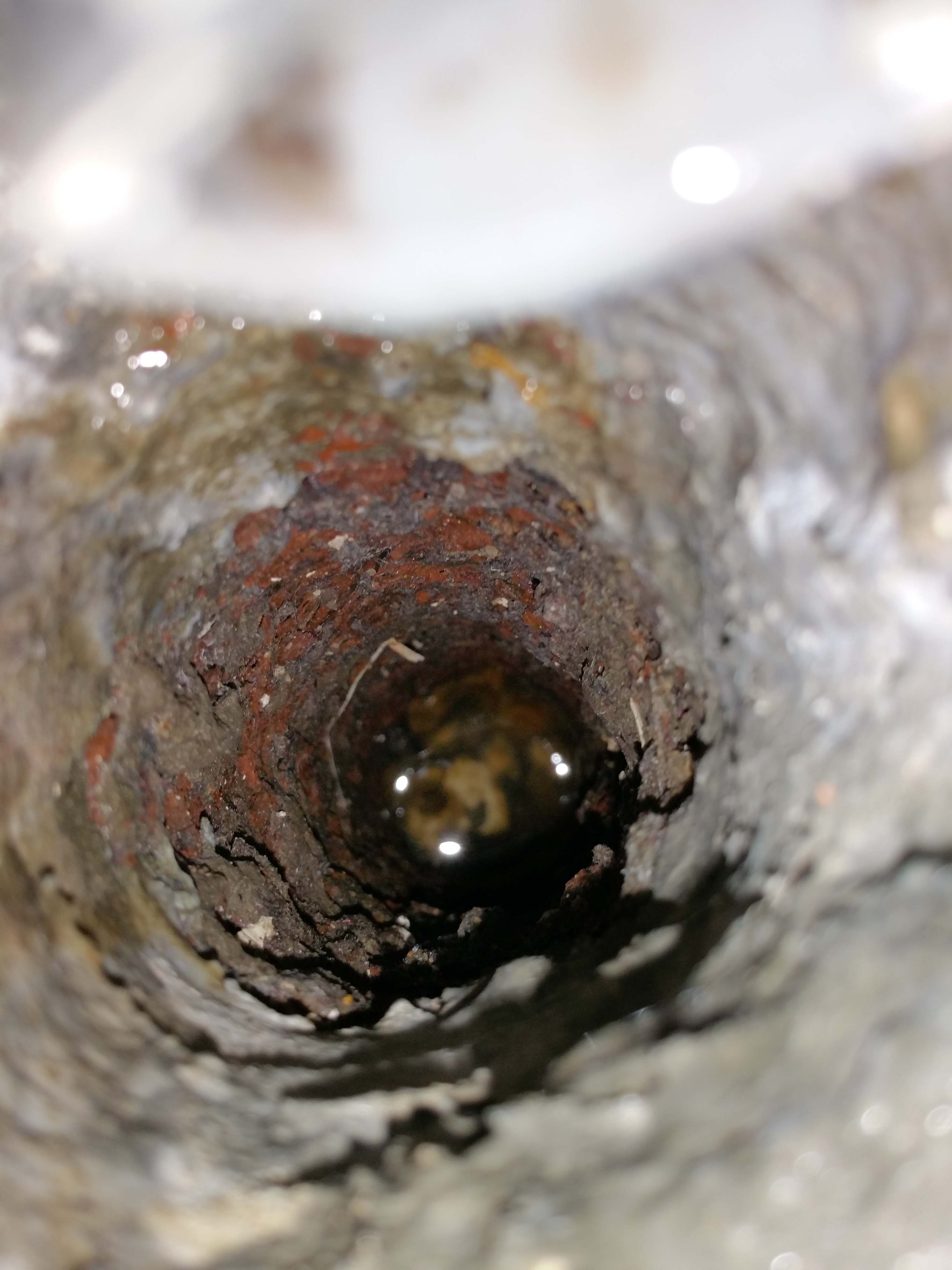 26. waste metal drain pipe corrosion. leak to downstairs..jpg